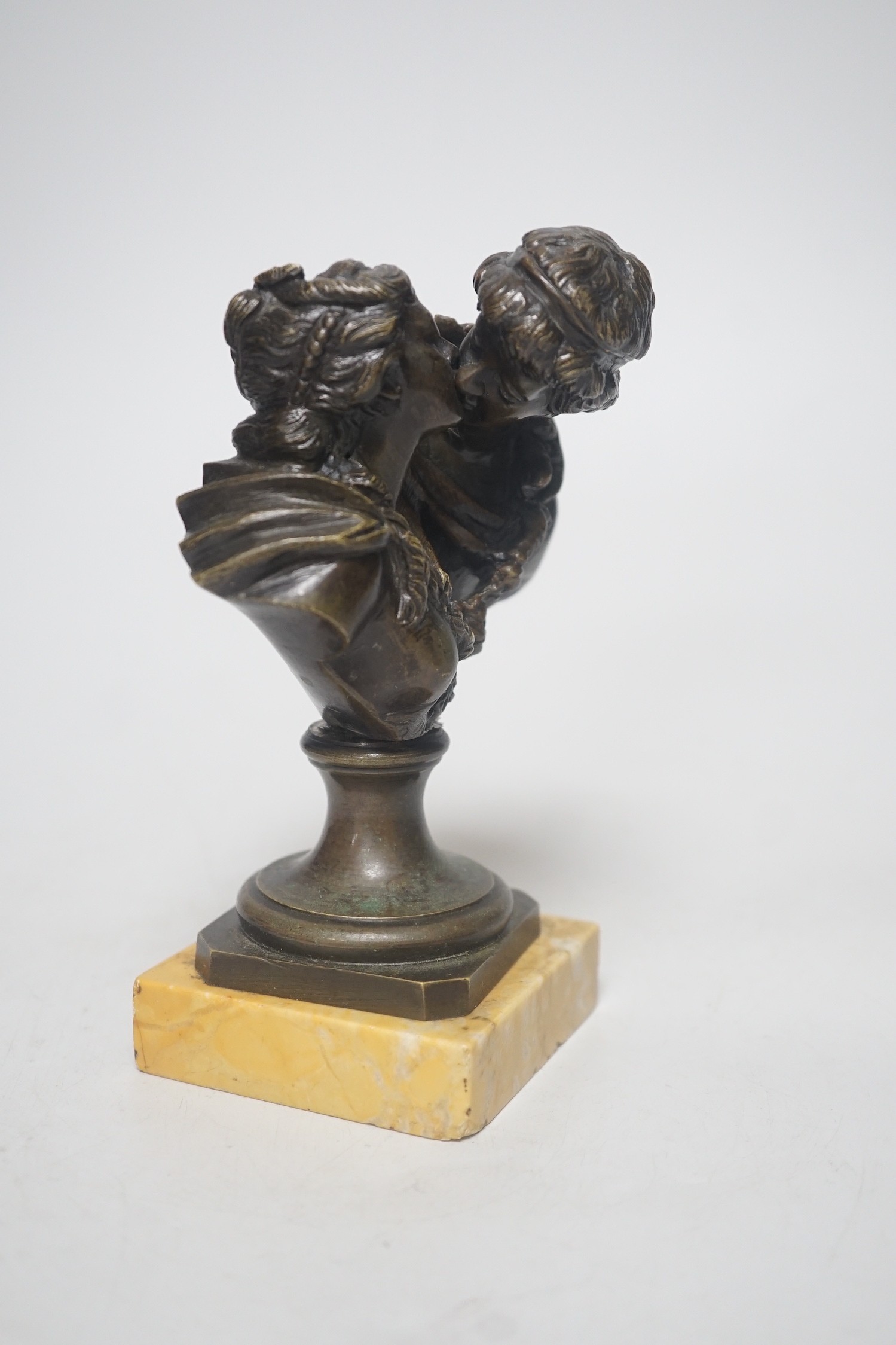 After Jean-Antoine Houdon (1741-1828), 'Le Baiser Donné' (The Kiss Bestowed], a 19th-century patinated bronze figure group, on a square Siena marble base, 16cm tall